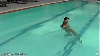 Fabulous t-girl poses in bikini poolside coupled with strips in shower